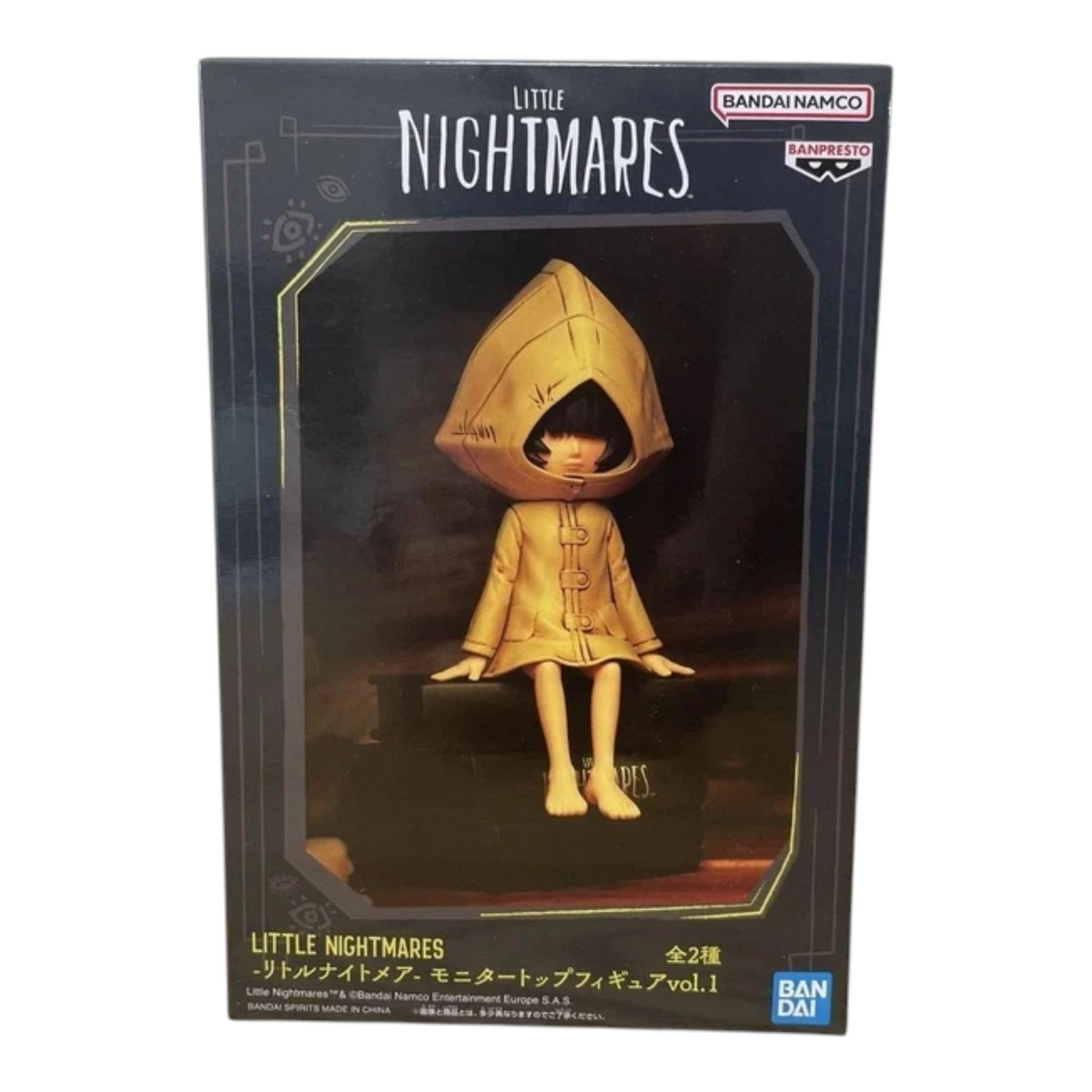 Boîte de la figurine Six Monitor Top Figure Vol. 1 – Little Nightmares, avec visuel de Six assise sur des livres.