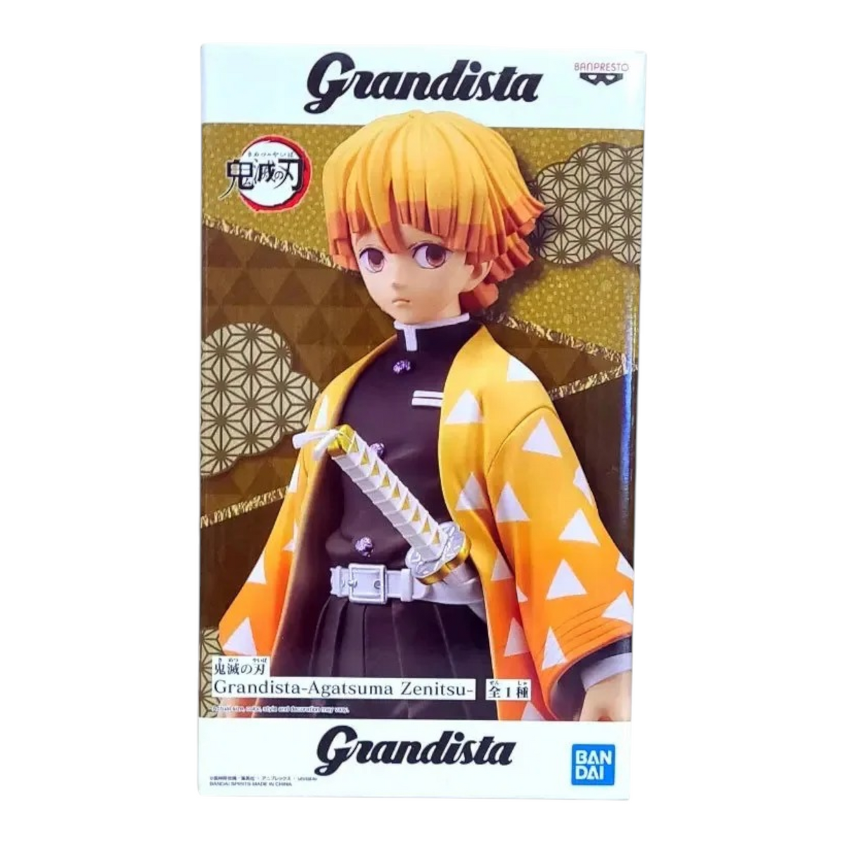 Boîte de la figurine Zenitsu Agatsuma Grandista – Demon Slayer, avec illustration du personnage en uniforme.