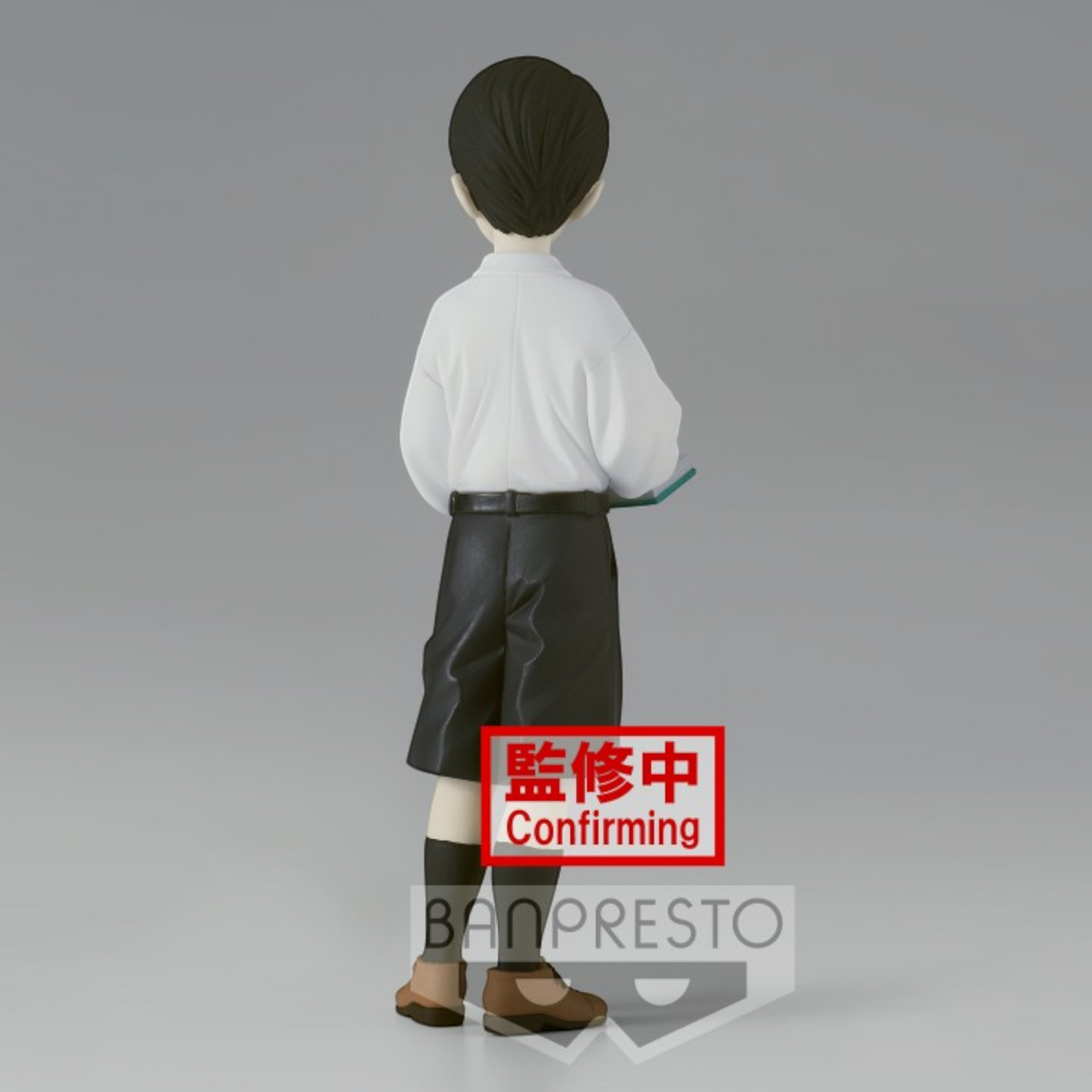 Figurine Muzan Kibutsuji Forme Enfant Demon Series – Demon Slayer, vue de dos avec livre.